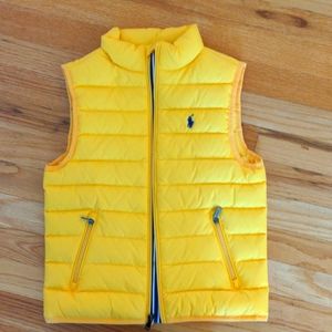 Yellow puffy puffer vest